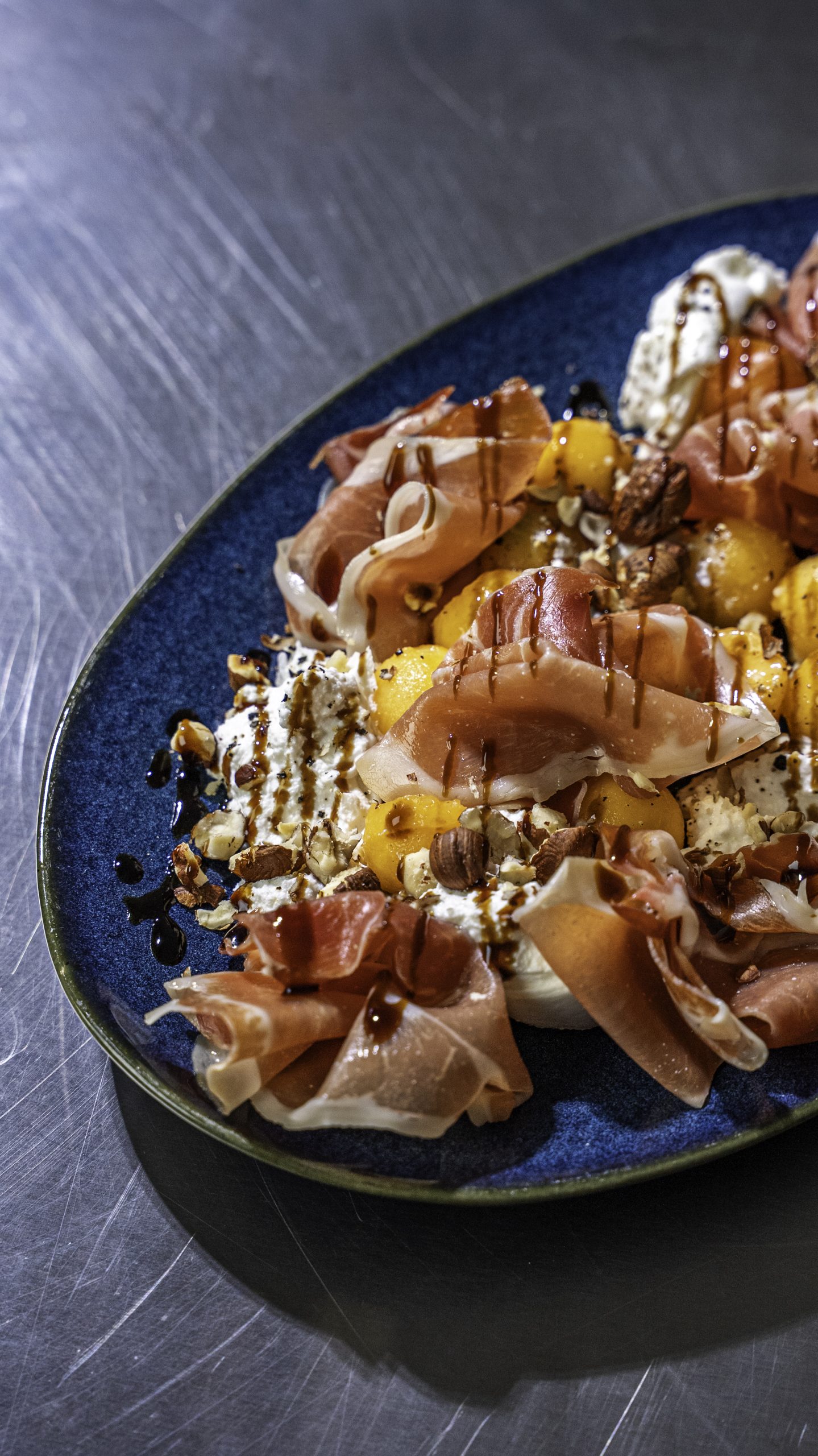 Salade italienne melon jambon cru burrata